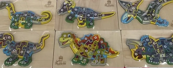 Prece Puzzle koka dinozauri Attēls